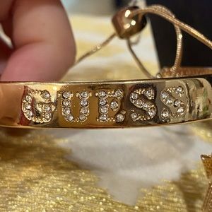 NWT GUESS GOOD TONE & RHINESTONE CUFF BRACELET W/slide clasp & dangle charms